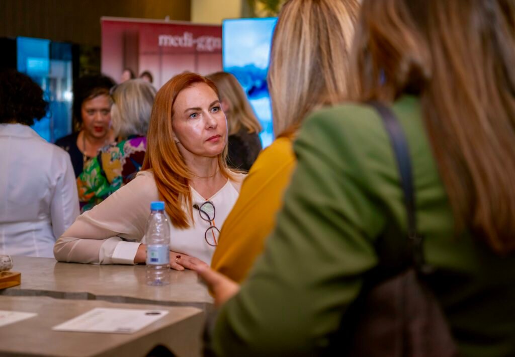 Home Women at a Medi-Gyn event discussing menopause weight gain and hormone health